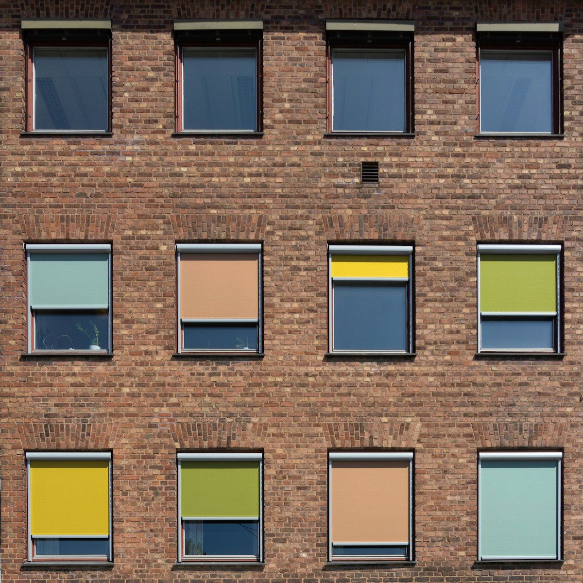 a large brick building with many windows